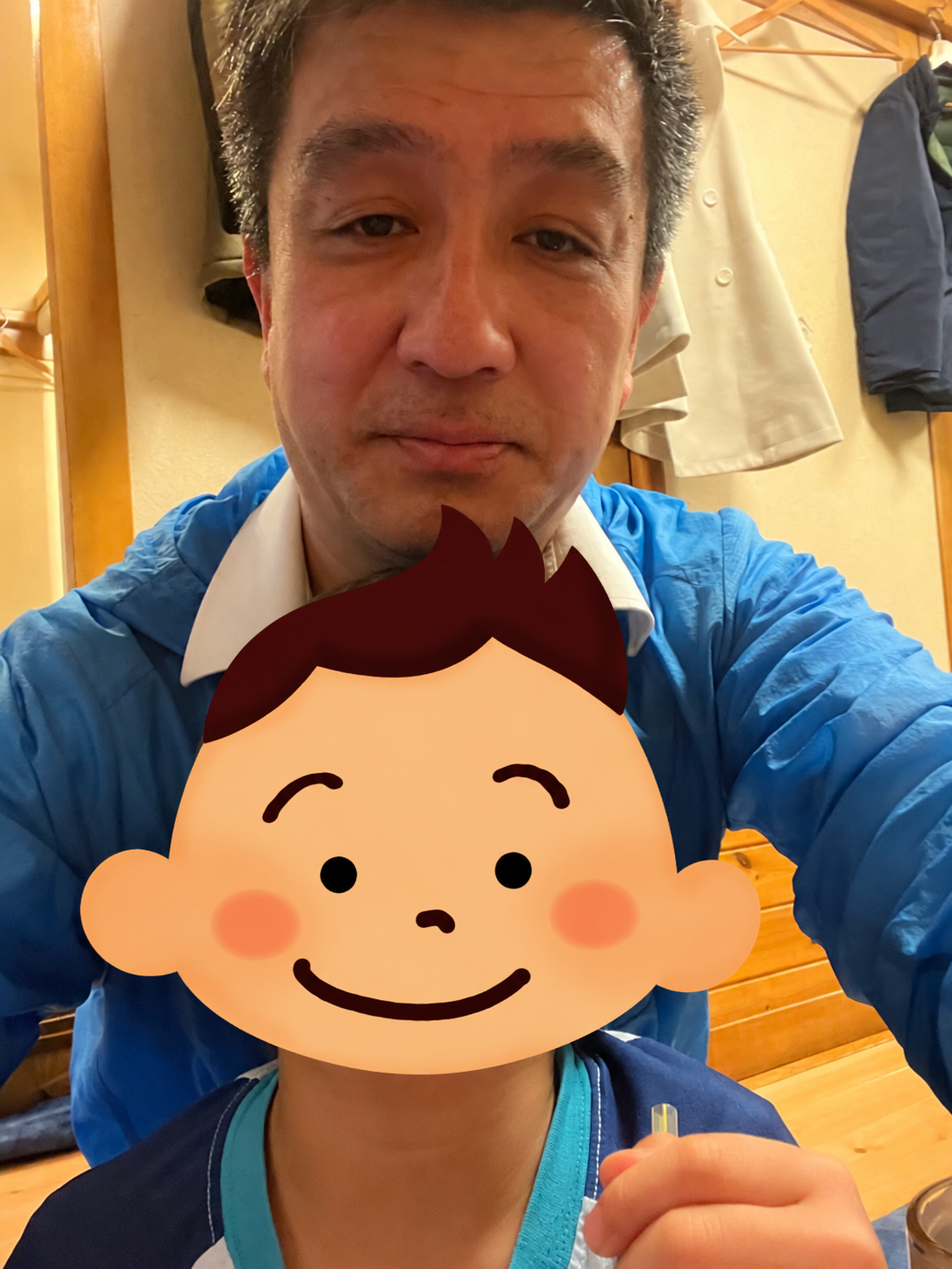 片谷洋夫と子どもの親子写真。子どもの顔はイラストで保護しています